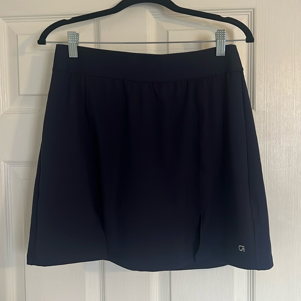 Navy Blue GapFit Skort. Built in shorts. New without tags. Size M Tall. Like new